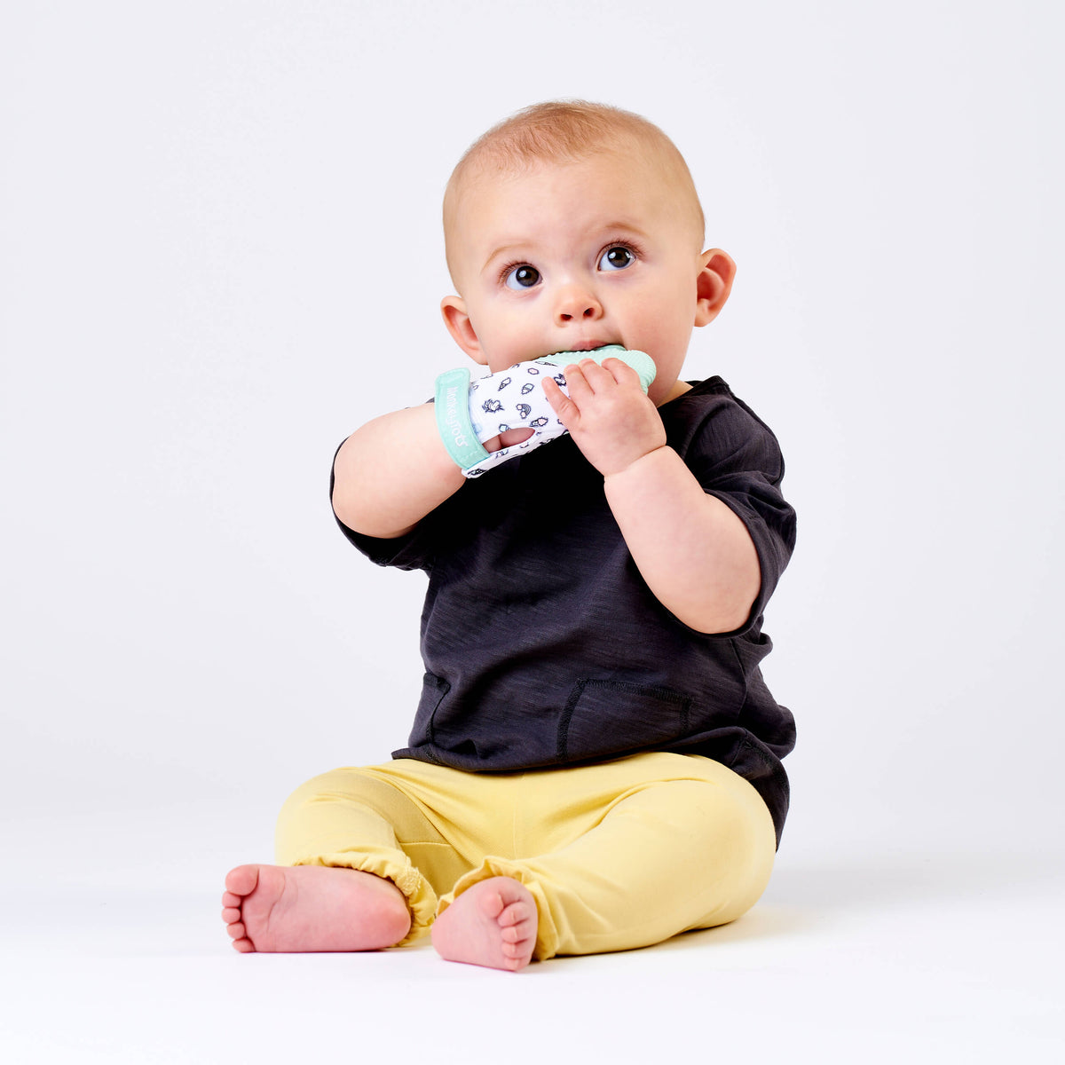 The UK's most popular baby teething mitten